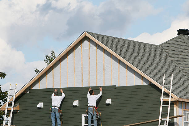 Professional Siding Installation technician working in Palmyra, IN